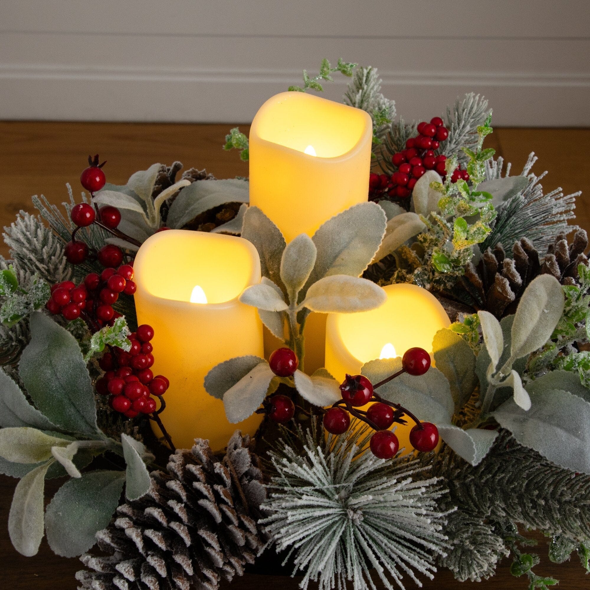 10” Artificial Christmas Flocked Pine & Berry Candle Centerpiece with Pinecones