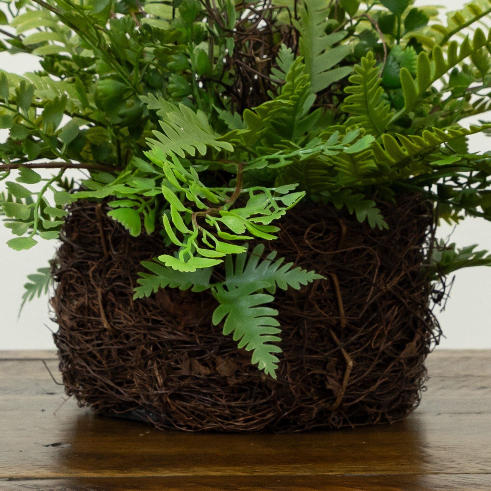 11" Artificial Mixed Fern Plant with Twig and Moss Basket
